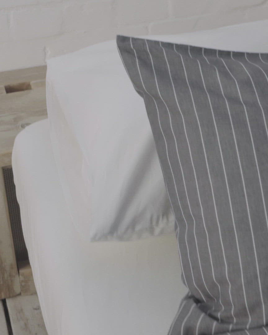 navy and white striped full bedding set including a fitted sheet, duvet cover and pillowcases