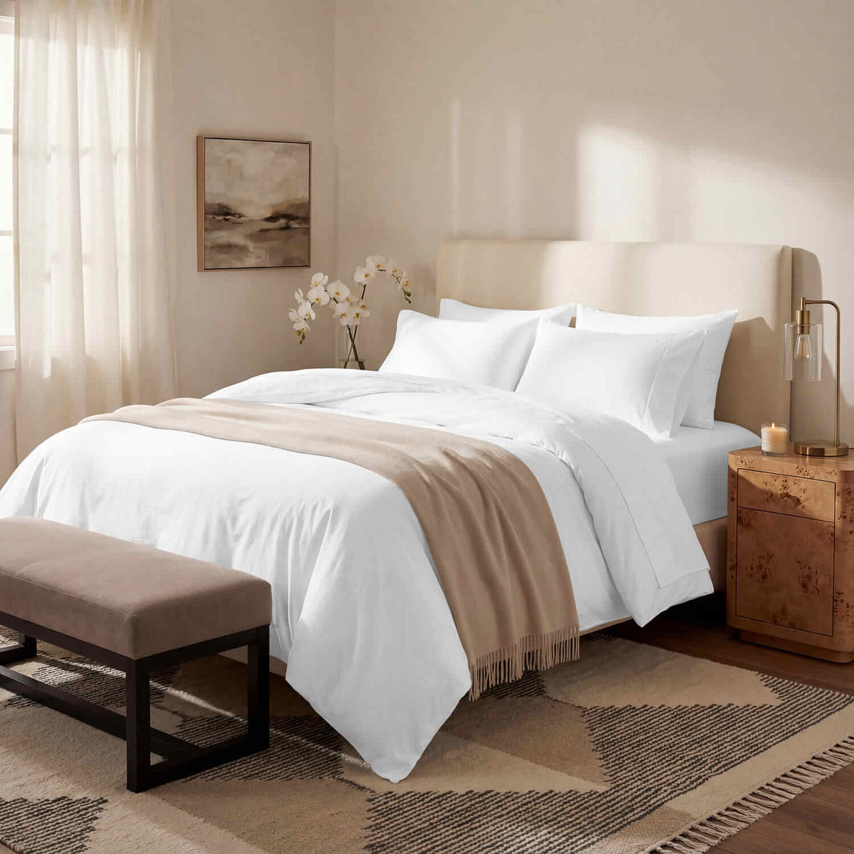 A made bed in white Bedable sateen bedding with a duvet and pillows