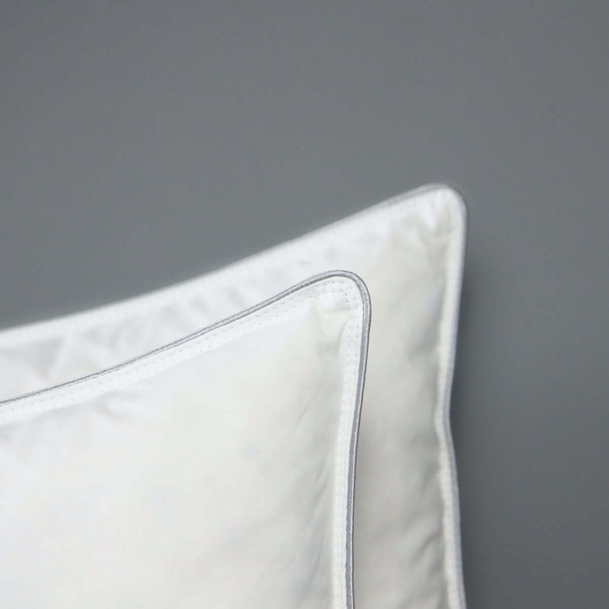 down pillow with grey piping